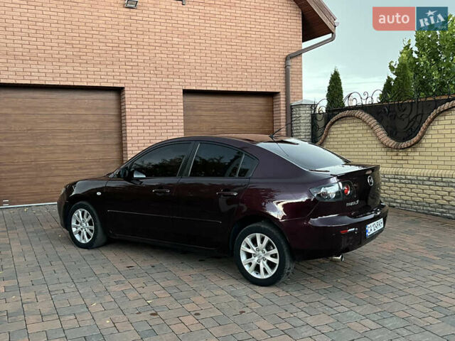 Мазда 3 2007 в Смеле на Automoto.ua Фиолетовый Мазда 3, объемом двигателя 1.6 л и пробегом 250 тыс. км за 4250 $, фото 16 на Automoto.ua