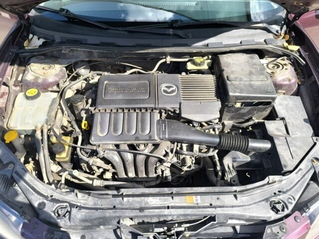 Фиолетовый Мазда 3, объемом двигателя 1.6 л и пробегом 170 тыс. км за 4175 $, фото 6 на Automoto.ua