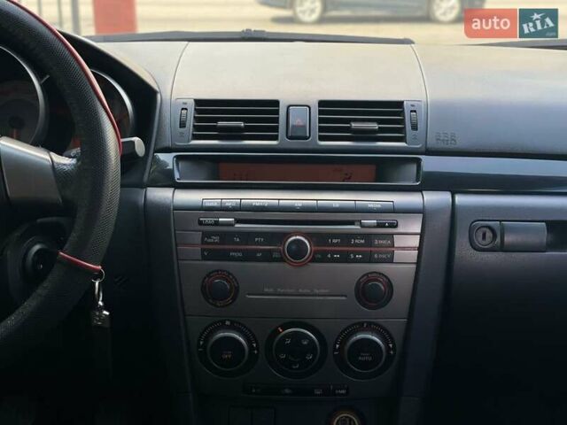 Фиолетовый Мазда 3, объемом двигателя 1.6 л и пробегом 294 тыс. км за 5400 $, фото 16 на Automoto.ua