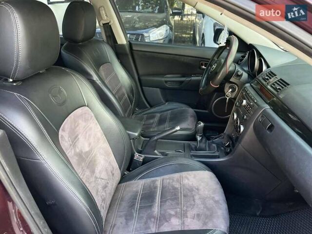 Фиолетовый Мазда 3, объемом двигателя 1.6 л и пробегом 294 тыс. км за 5400 $, фото 18 на Automoto.ua