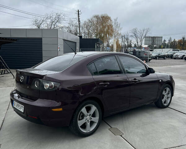 Фиолетовый Мазда 3, объемом двигателя 2 л и пробегом 222 тыс. км за 4700 $, фото 7 на Automoto.ua