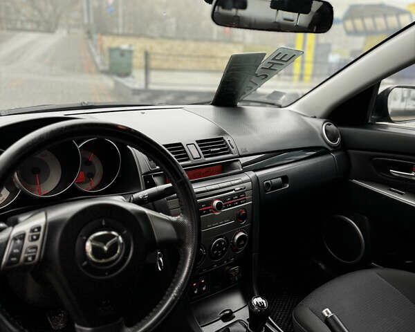 Фіолетовий Мазда 3, об'ємом двигуна 1.6 л та пробігом 204 тис. км за 5250 $, фото 8 на Automoto.ua