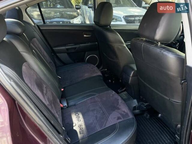 Фиолетовый Мазда 3, объемом двигателя 1.6 л и пробегом 294 тыс. км за 5400 $, фото 20 на Automoto.ua