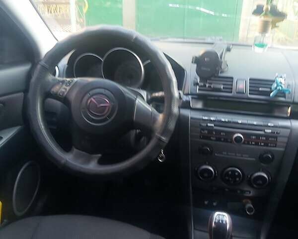 Фиолетовый Мазда 3, объемом двигателя 1.6 л и пробегом 210 тыс. км за 5500 $, фото 8 на Automoto.ua