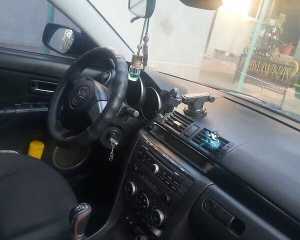 Фиолетовый Мазда 3, объемом двигателя 1.6 л и пробегом 210 тыс. км за 5500 $, фото 6 на Automoto.ua