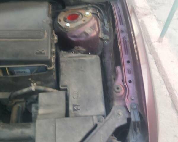 Фиолетовый Мазда 3, объемом двигателя 1.6 л и пробегом 210 тыс. км за 5500 $, фото 4 на Automoto.ua