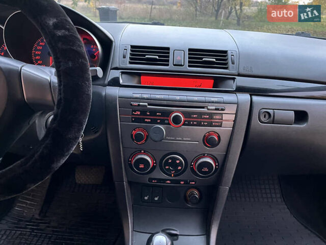 Мазда 3 2007 в Смеле на Automoto.ua Фиолетовый Мазда 3, объемом двигателя 1.6 л и пробегом 250 тыс. км за 4250 $, фото 31 на Automoto.ua
