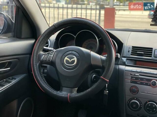 Фиолетовый Мазда 3, объемом двигателя 1.6 л и пробегом 294 тыс. км за 5400 $, фото 13 на Automoto.ua