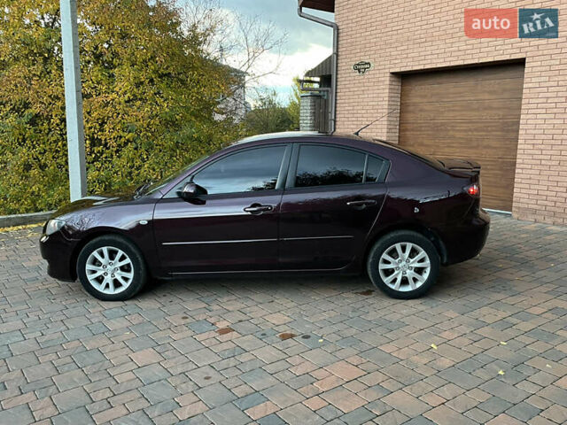 Мазда 3 2007 в Смеле на Automoto.ua Фиолетовый Мазда 3, объемом двигателя 1.6 л и пробегом 250 тыс. км за 4250 $, фото 14 на Automoto.ua