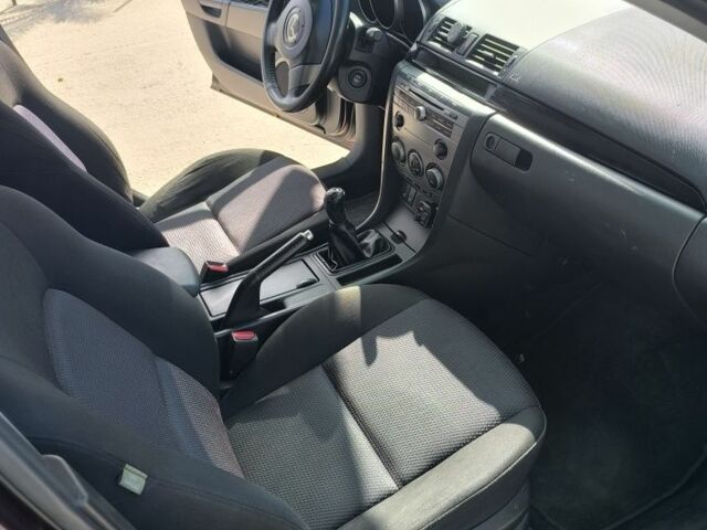 Фиолетовый Мазда 3, объемом двигателя 1.6 л и пробегом 170 тыс. км за 4175 $, фото 7 на Automoto.ua