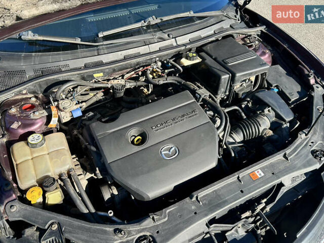 Фиолетовый Мазда 3, объемом двигателя 2 л и пробегом 248 тыс. км за 5100 $, фото 7 на Automoto.ua