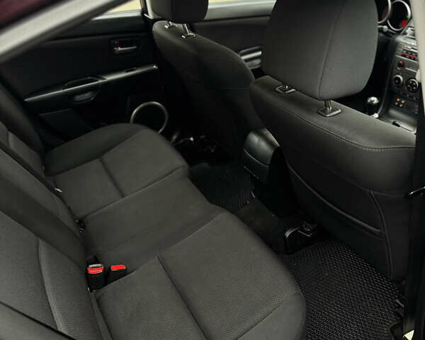 Фіолетовий Мазда 3, об'ємом двигуна 1.6 л та пробігом 204 тис. км за 5250 $, фото 47 на Automoto.ua