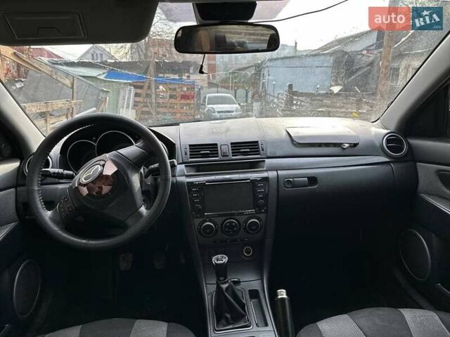 Фіолетовий Мазда 3, об'ємом двигуна 2 л та пробігом 170 тис. км за 3000 $, фото 12 на Automoto.ua