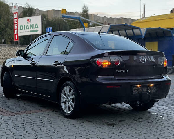 Фіолетовий Мазда 3, об'ємом двигуна 1.6 л та пробігом 224 тис. км за 5899 $, фото 15 на Automoto.ua