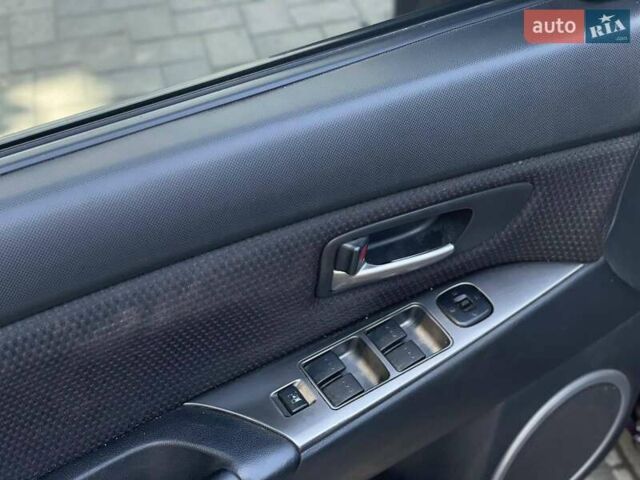 Фиолетовый Мазда 3, объемом двигателя 1.6 л и пробегом 294 тыс. км за 5400 $, фото 11 на Automoto.ua