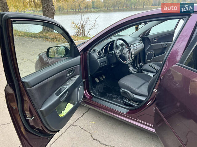 Фиолетовый Мазда 3, объемом двигателя 1.6 л и пробегом 211 тыс. км за 3750 $, фото 10 на Automoto.ua