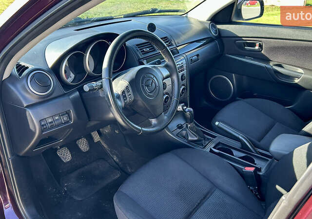 Фиолетовый Мазда 3, объемом двигателя 2 л и пробегом 248 тыс. км за 5100 $, фото 8 на Automoto.ua
