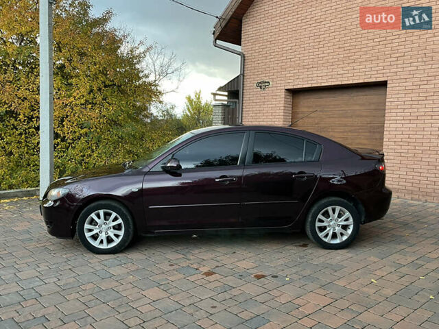 Мазда 3 2007 в Смеле на Automoto.ua Фиолетовый Мазда 3, объемом двигателя 1.6 л и пробегом 250 тыс. км за 4250 $, фото 15 на Automoto.ua