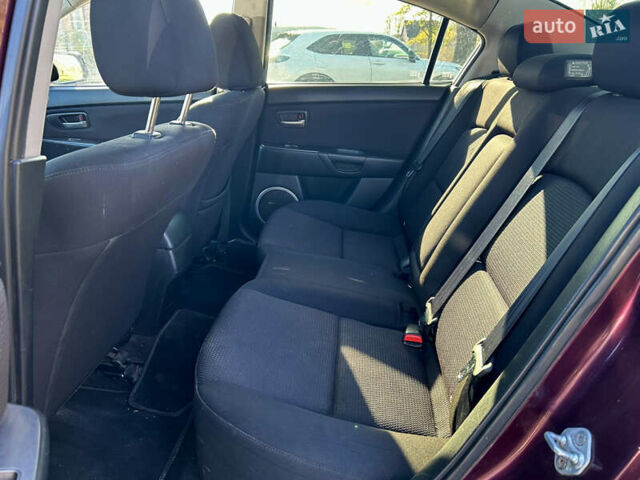 Фиолетовый Мазда 3, объемом двигателя 2 л и пробегом 248 тыс. км за 5100 $, фото 10 на Automoto.ua