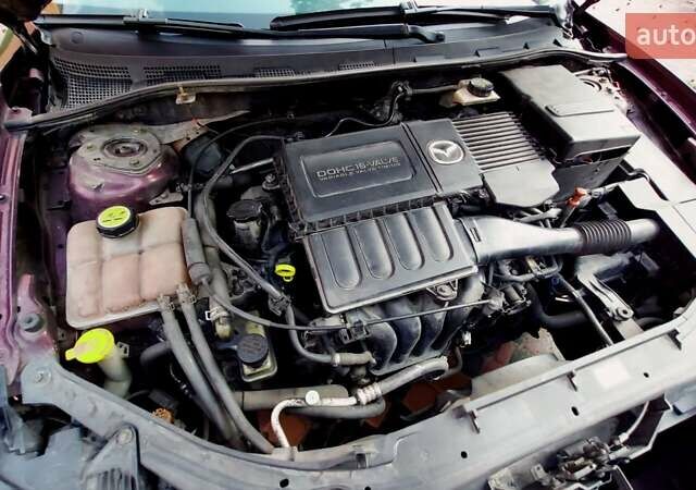 Фіолетовий Мазда 3, об'ємом двигуна 1.59 л та пробігом 235 тис. км за 6400 $, фото 27 на Automoto.ua