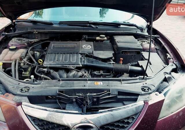 Фіолетовий Мазда 3, об'ємом двигуна 1.59 л та пробігом 235 тис. км за 6400 $, фото 29 на Automoto.ua