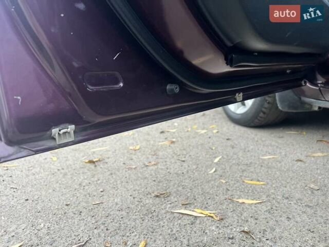 Фиолетовый Мазда 3, объемом двигателя 1.6 л и пробегом 211 тыс. км за 3750 $, фото 45 на Automoto.ua