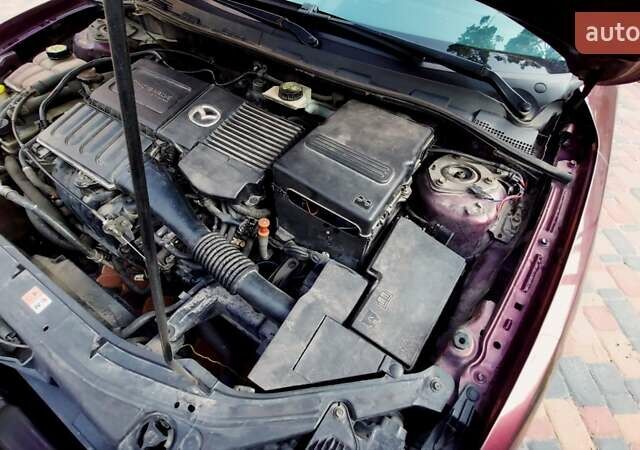 Фіолетовий Мазда 3, об'ємом двигуна 1.59 л та пробігом 235 тис. км за 6400 $, фото 28 на Automoto.ua