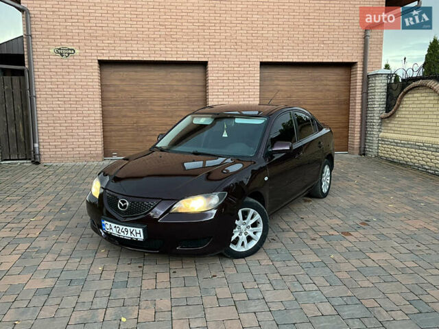 Мазда 3 2007 в Смеле на Automoto.ua Фиолетовый Мазда 3, объемом двигателя 1.6 л и пробегом 250 тыс. км за 4250 $, фото 4 на Automoto.ua