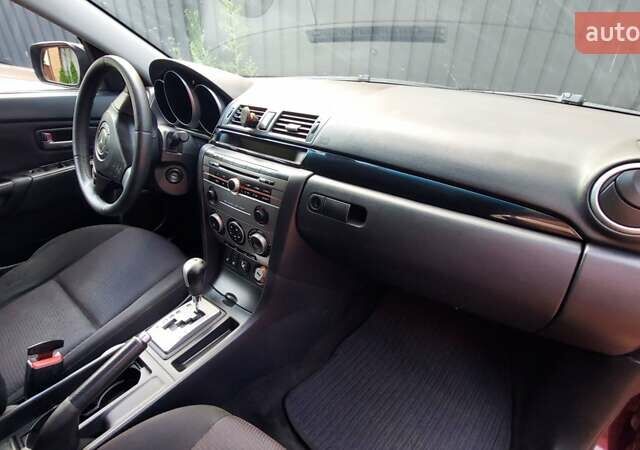 Фіолетовий Мазда 3, об'ємом двигуна 1.59 л та пробігом 235 тис. км за 6400 $, фото 12 на Automoto.ua