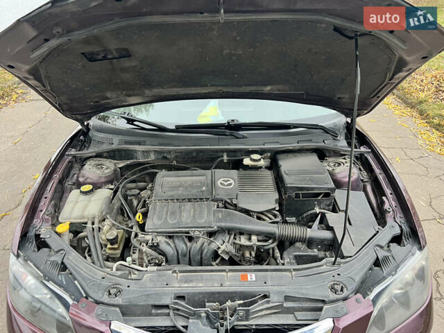 Фиолетовый Мазда 3, объемом двигателя 1.6 л и пробегом 211 тыс. км за 3750 $, фото 38 на Automoto.ua