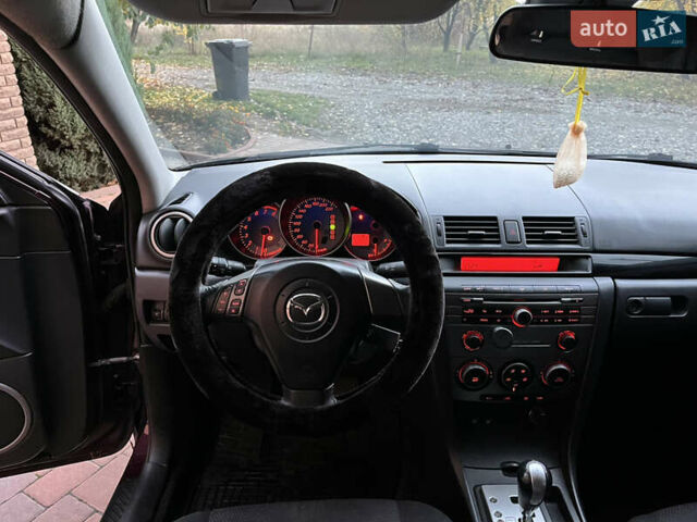 Мазда 3 2007 в Смеле на Automoto.ua Фиолетовый Мазда 3, объемом двигателя 1.6 л и пробегом 250 тыс. км за 4250 $, фото 29 на Automoto.ua