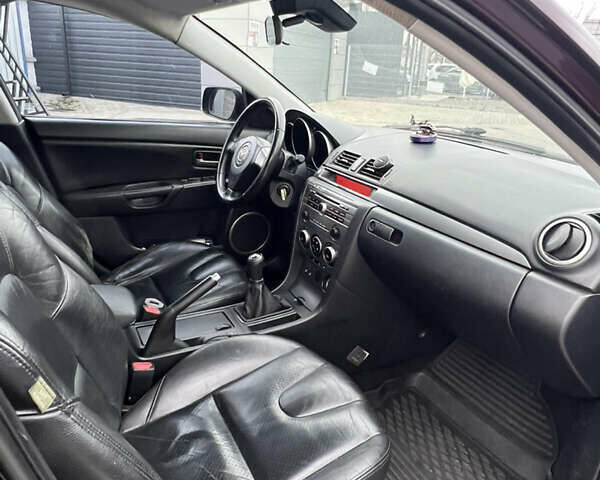Фиолетовый Мазда 3, объемом двигателя 2 л и пробегом 222 тыс. км за 4700 $, фото 16 на Automoto.ua