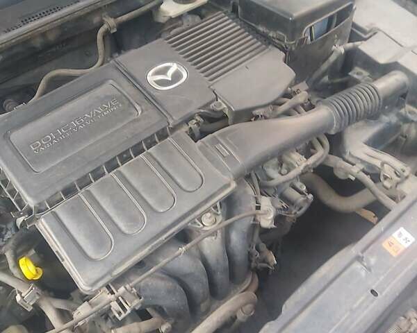 Фиолетовый Мазда 3, объемом двигателя 1.6 л и пробегом 210 тыс. км за 5500 $, фото 11 на Automoto.ua