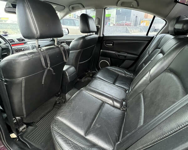 Фиолетовый Мазда 3, объемом двигателя 2 л и пробегом 222 тыс. км за 4700 $, фото 18 на Automoto.ua