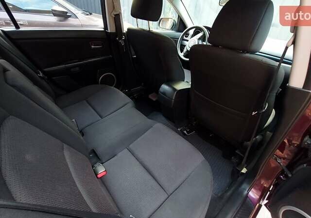 Фіолетовий Мазда 3, об'ємом двигуна 1.59 л та пробігом 235 тис. км за 6400 $, фото 25 на Automoto.ua