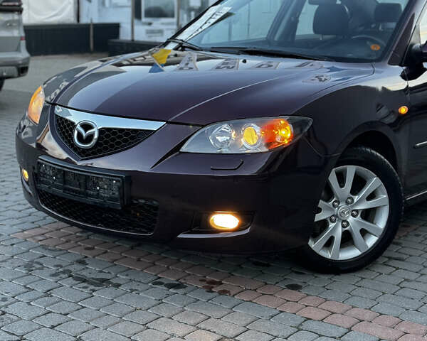 Фіолетовий Мазда 3, об'ємом двигуна 1.6 л та пробігом 224 тис. км за 5899 $, фото 9 на Automoto.ua