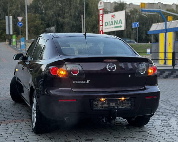 Фіолетовий Мазда 3, об'ємом двигуна 1.6 л та пробігом 224 тис. км за 5899 $, фото 17 на Automoto.ua