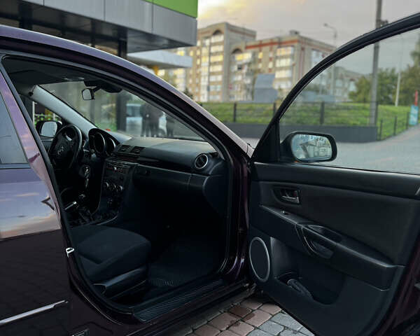 Фіолетовий Мазда 3, об'ємом двигуна 1.6 л та пробігом 224 тис. км за 5899 $, фото 48 на Automoto.ua