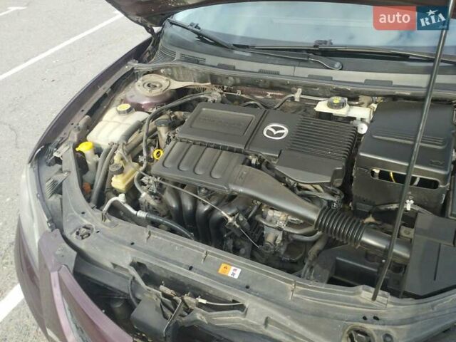 Фиолетовый Мазда 3, объемом двигателя 1.6 л и пробегом 155 тыс. км за 5800 $, фото 4 на Automoto.ua