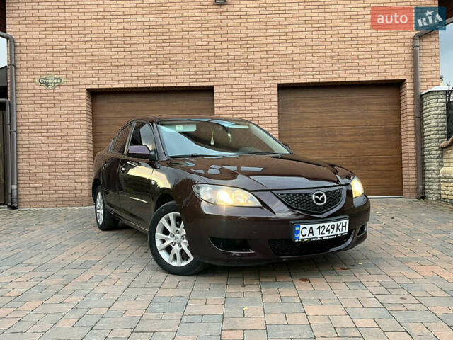 Мазда 3 2007 в Смеле на Automoto.ua Фиолетовый Мазда 3, объемом двигателя 1.6 л и пробегом 250 тыс. км за 4250 $, фото 2 на Automoto.ua