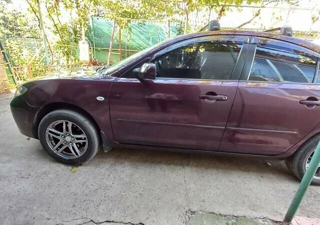 Фиолетовый Мазда 3, объемом двигателя 1.6 л и пробегом 210 тыс. км за 5500 $, фото 3 на Automoto.ua