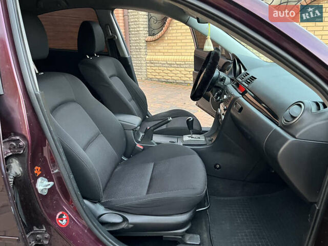 Мазда 3 2007 в Смеле на Automoto.ua Фиолетовый Мазда 3, объемом двигателя 1.6 л и пробегом 250 тыс. км за 4250 $, фото 26 на Automoto.ua