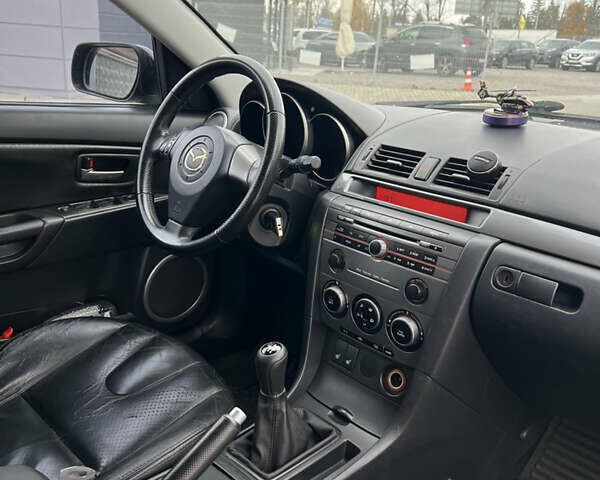 Фиолетовый Мазда 3, объемом двигателя 2 л и пробегом 222 тыс. км за 4700 $, фото 17 на Automoto.ua