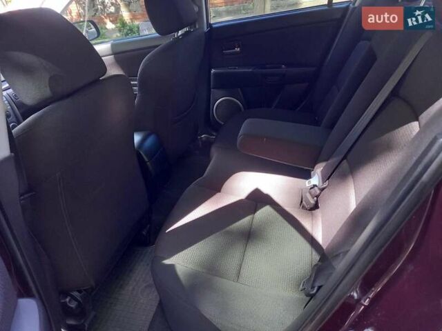 Мазда 3 2008 в Киеве на Automoto.ua Фиолетовый Мазда 3, объемом двигателя 1.6 л и пробегом 178 тыс. км за 5900 $, фото 8 на Automoto.ua