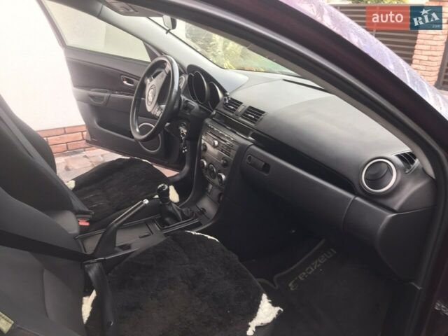 Фиолетовый Мазда 3, объемом двигателя 1.6 л и пробегом 203 тыс. км за 5800 $, фото 8 на Automoto.ua