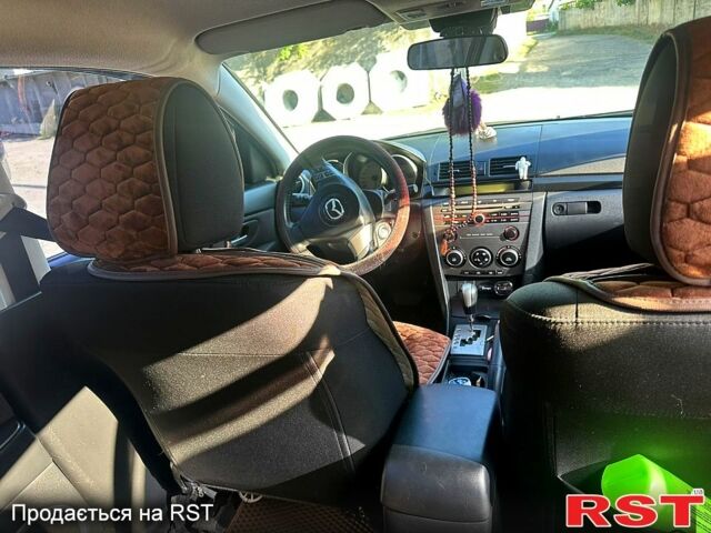Фиолетовый Мазда 3, объемом двигателя 1.6 л и пробегом 158 тыс. км за 6300 $, фото 3 на Automoto.ua