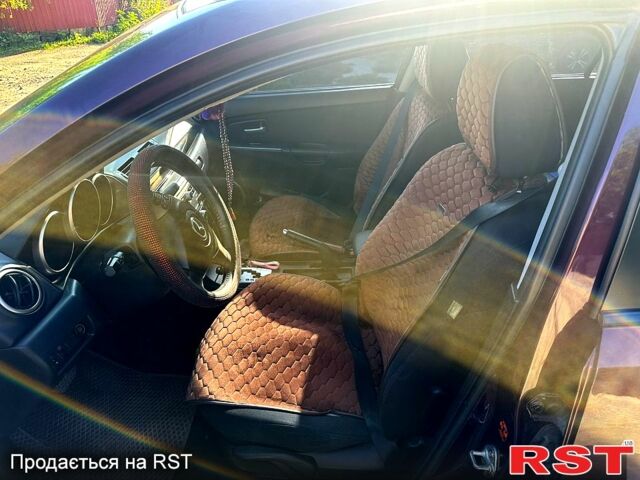 Фиолетовый Мазда 3, объемом двигателя 1.6 л и пробегом 158 тыс. км за 6300 $, фото 7 на Automoto.ua
