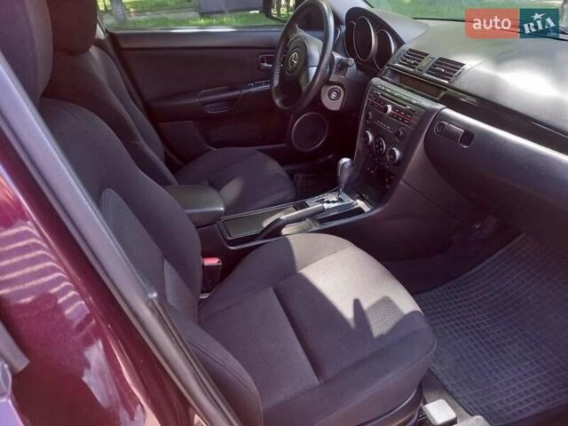 Мазда 3 2008 в Киеве на Automoto.ua Фиолетовый Мазда 3, объемом двигателя 1.6 л и пробегом 178 тыс. км за 5900 $, фото 4 на Automoto.ua