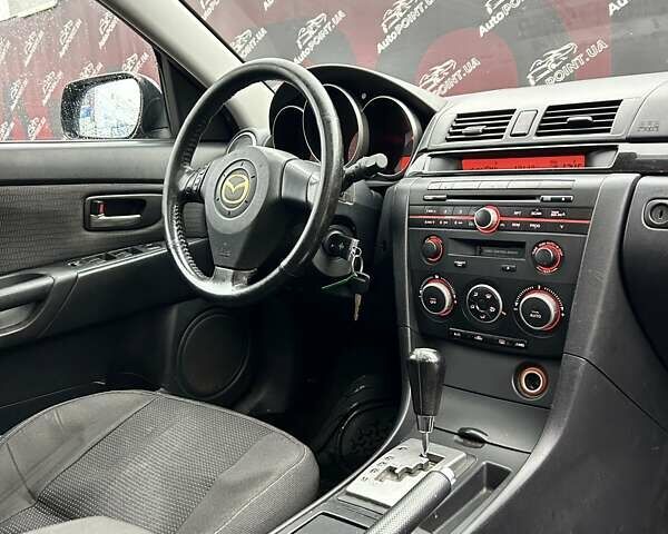 Фиолетовый Мазда 3, объемом двигателя 1.6 л и пробегом 232 тыс. км за 4800 $, фото 24 на Automoto.ua