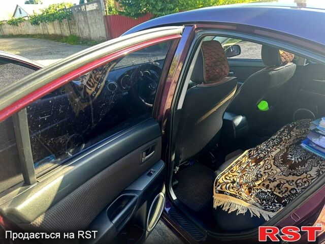 Фиолетовый Мазда 3, объемом двигателя 1.6 л и пробегом 158 тыс. км за 6300 $, фото 4 на Automoto.ua